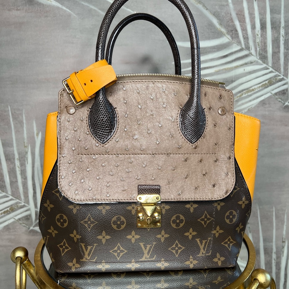 LOUIS VUITTON
Limited Edition Ostrich skin Exotique Monogram Majestueux PM Bag